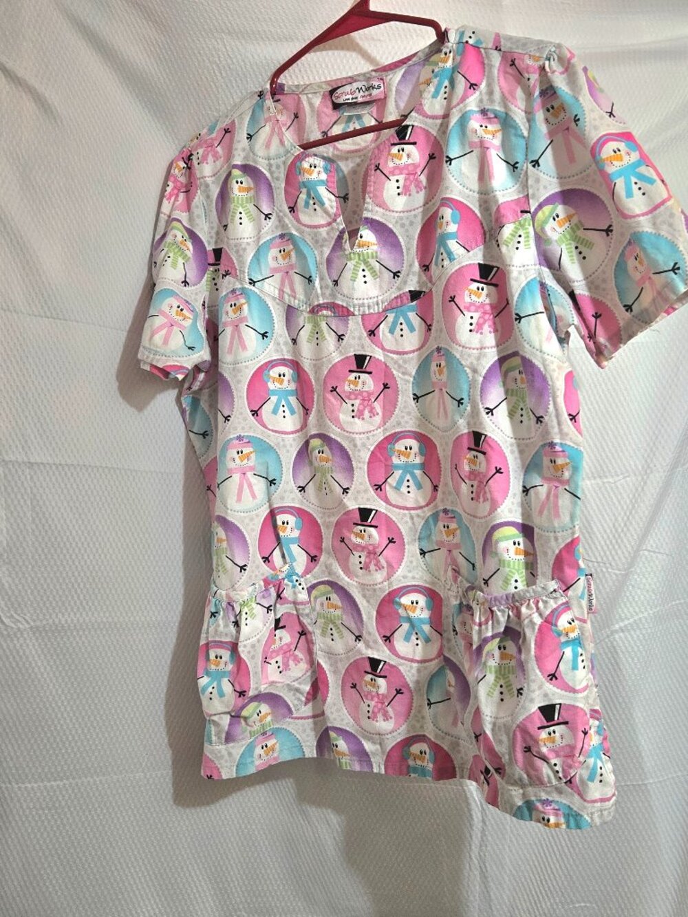 Scrub Works Women's Christmas Snowman Scrub Top – Pink, Blue & Purple Winter-L